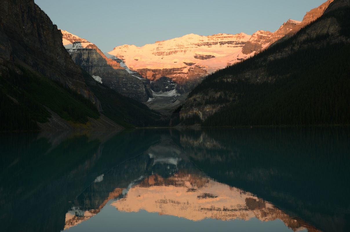 20 First Rays Of Sunrise Burn Mount Victoria Yellow Orange Reflected In The Still Waters Of Lake Louise